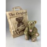 A Steiff Classic teddy bear, with growler, in beige mohair, 35cm long, with all labels, in Steiff