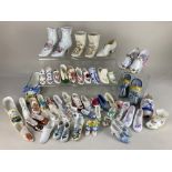 A very large collection of porcelain and glass model shoes, makers including Masons, Hammersley,