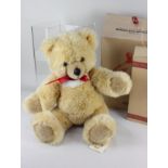 A Steiff Molly teddy bear, with ear button and maker's tags, 55cm high