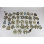 A collection of horse brasses, various designs to include Lady Godiva, Fat Boy etc