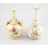 A Royal Worcester blush ivory porcelain vase, of globular form with waisted neck and mask handles,