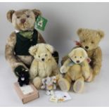 A Steiff Club 2000 black mohair miniature teddy bear, with ear button and maker's tags, 7cm high,