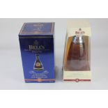A Bell's limited edition Golden Jubilee scotch whiskey in Wade blue ceramic decanter aged 8 years
