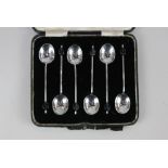 A cased set of six George V silver spoons with coffee bean ends, by Barker Brothers Silver Ltd.,