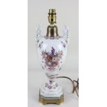 A brass mounted armorial porcelain table lamp, with two scroll handles, 39.5cm high