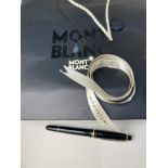 A Montblanc Meisterstuck fountain pen, the 14k nib stamped 4810, Montblanc 585, the pocket clip