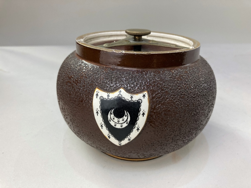 A Bacon Brothers, Cambidge pottery tobacco jar and cover, with crescent moon shield on brown