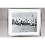 A framed reproduction black and white photograph of 'Lunch atop a Skyscraper, Rockerfeller