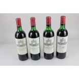 Four bottles of Grand Vin de Leoville Saint Julien-Medoc red wine