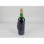 A bottle of Saint-Emilion Chateau Arnaud de Jacquemaud 1985 red wine
