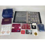 A large collection of George V, George VI and Elizabeth II coinage, including some in folders,