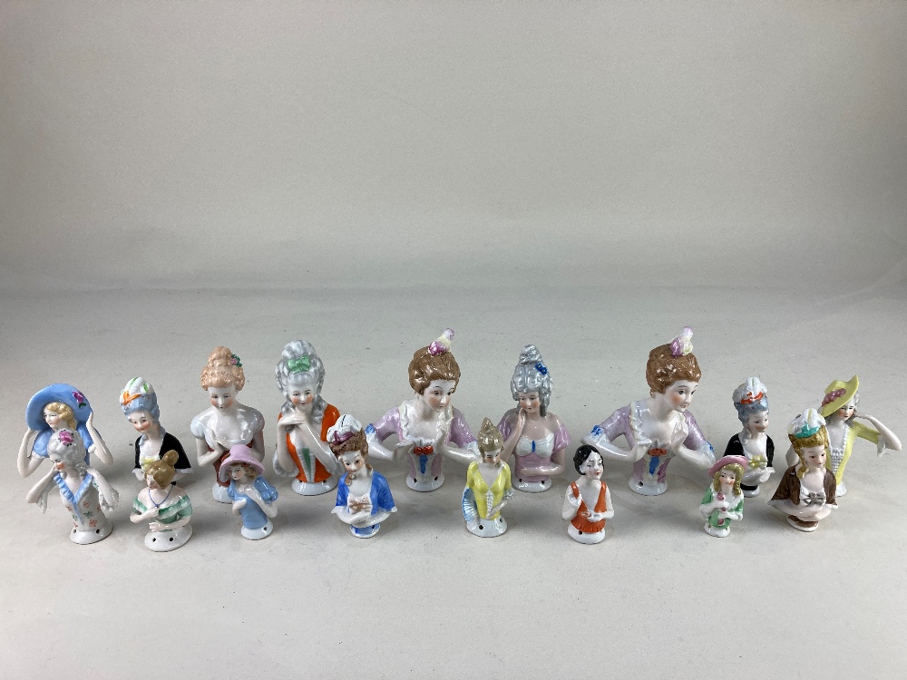 A collection of seventeen porcelain half dolls, tallest 13cm, (some a/f)