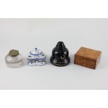 A Victorian bell shaped black glazed ink well, marked 'Williams's Ink Pot Rd No 331808, 11cm, and