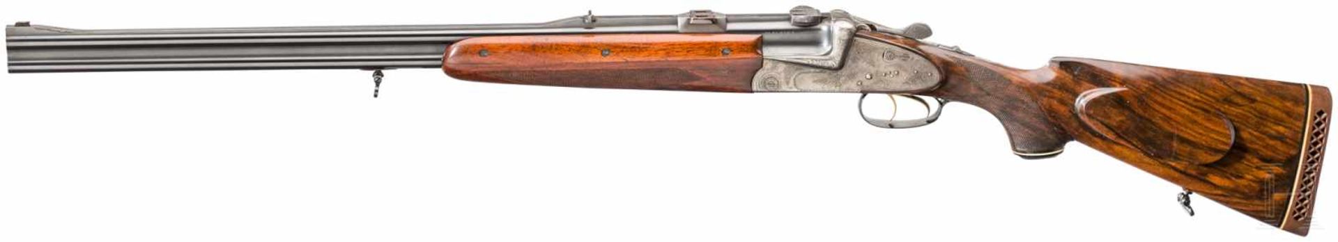 A cased O/U double rifle by Winkler, Ferlach, with Kahles scope and interchangeable O/U - Bild 2 aus 5