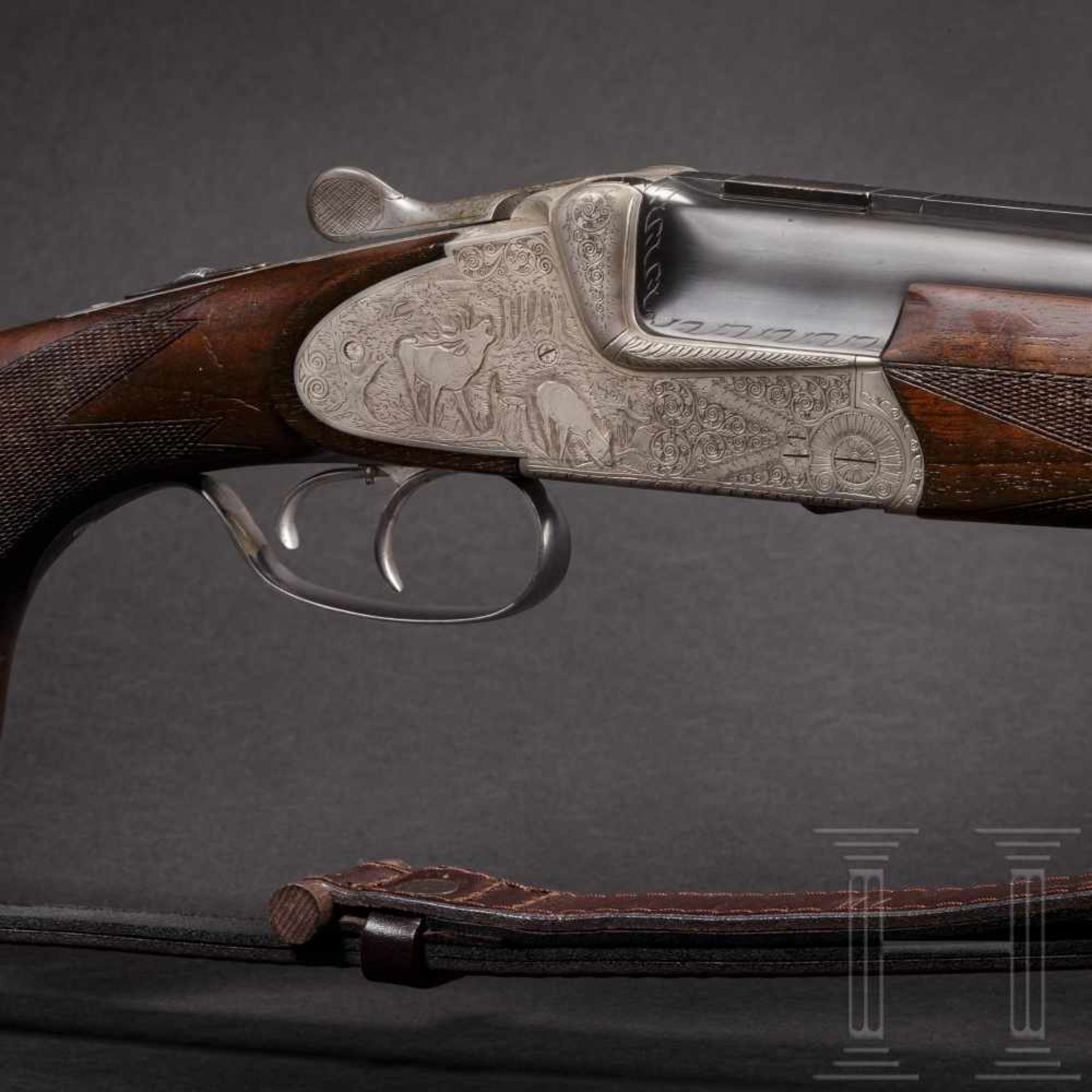 An over and under Scheiring-Düsel combination rifle with insert barrel and Schmidt & Bender