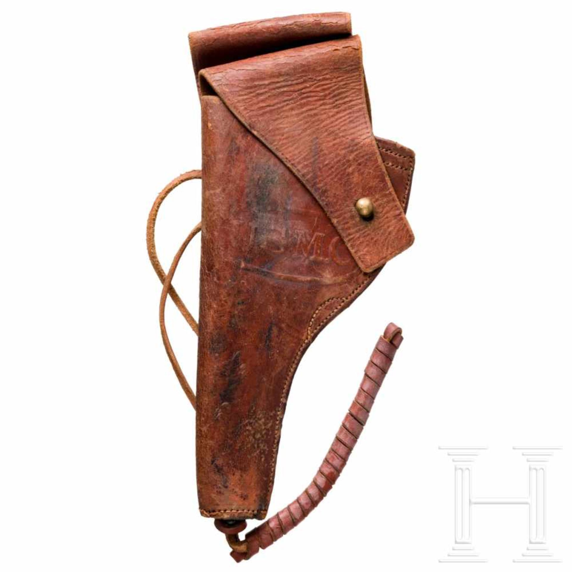 Revolvertasche des U.S.M.C.Aus kräftigem, braunen Rindsleder ohne Hersteller. Vorderseite mit