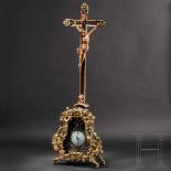 A fine and imposing Austrian/South German free-standing Rococo crucifix with lunette, circa