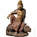 A Chinese cast iron statue of the bodhisattva Guanyin, Ming dynastyForged in one piece of hollow-