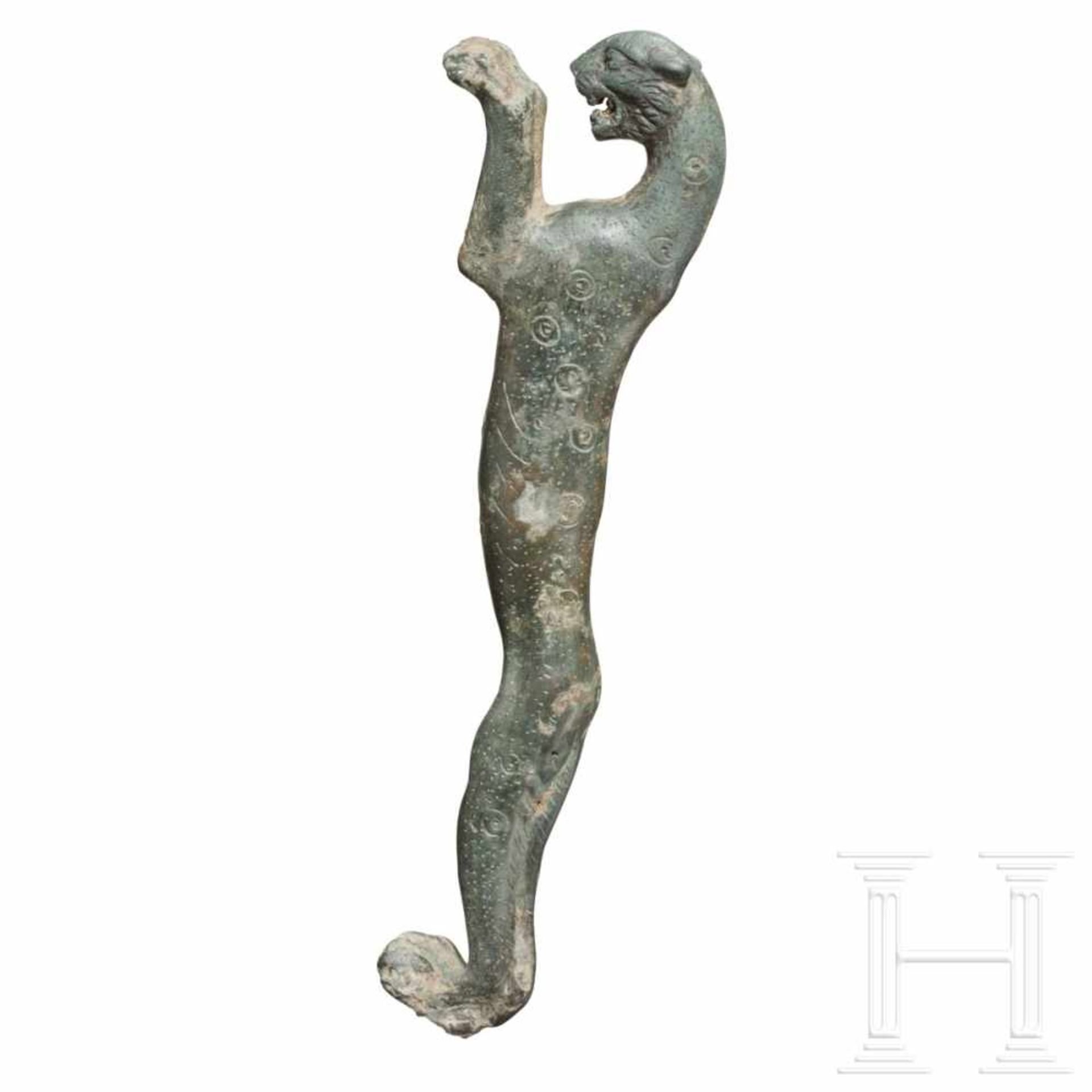 A Roman bronze handle in the shape of a panther, 2nd - 3rd centuryFurniture handle in the shape of a