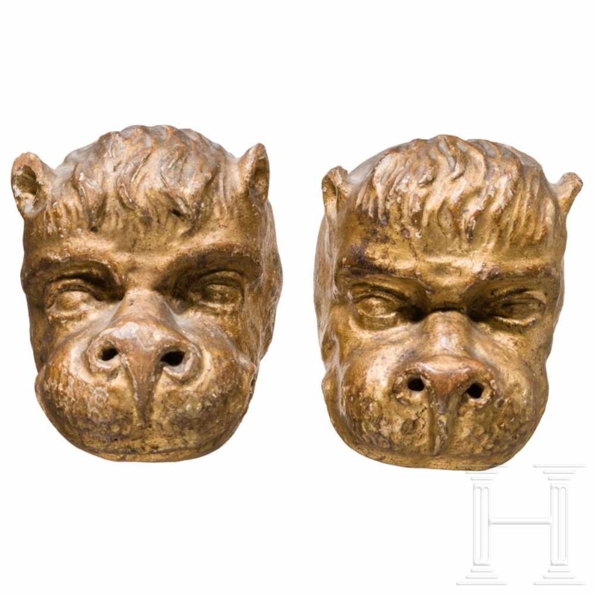 A Tyrolese pair of carved and originally gilded Baroque lion heads, 18th centuryLimewood. Traces due