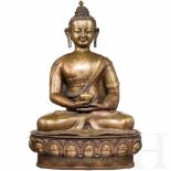 A large Nepalese bronze Buddha, 19th centuryPolished bronze cast with intricately engraved