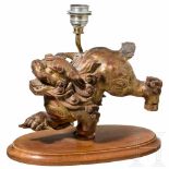 A carved and gilded Chinese sculpture of a "Fo"-lion mounted as a lamp, 19th centuryCarved and