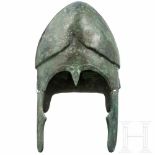 A South-East European Chalcidian helmet, type V, 4th century BCThe skull hammered in one piece, with