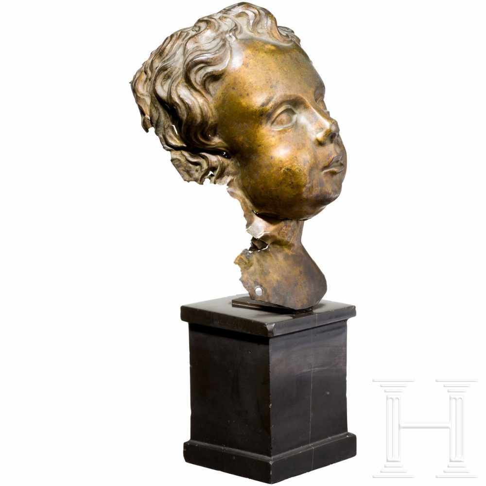 An Italian Baroque head of a putto, 17th centuryGilt copper sculpture of an angel’s head in half - Image 2 of 3