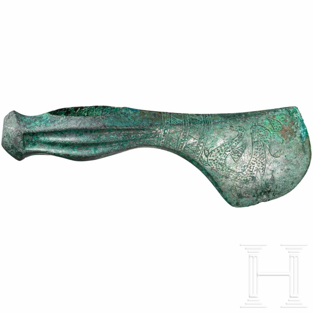 A decorated Koban-Caucasian bronze axe, 9th – 8th century B.C.Important bronze axe of the