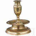 A brass candle holder with bell-shaped base, Nuremberg, mid-17th centuryMessing mit schöner