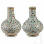 An almost identical pair of Chinese bat vases, Kuang Hsu period, 19th centuryPorcelain. On sturdy