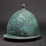 A Roman bronze helmet of the Buggenum type, 1st century B.C.The almost hemispherical skull