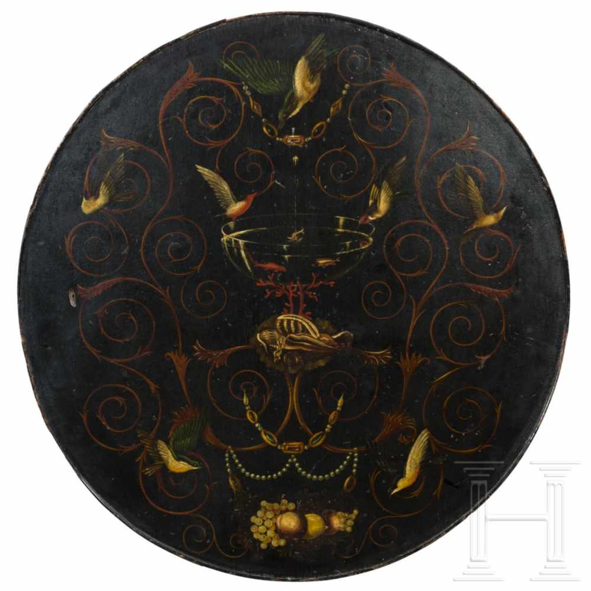 A highly decorative Italian table leaf, Venice, circa 1700The round wooden leaf with a black