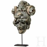An expressive Italian neoclassical mask from a Boisserie, finely carved and painted, 19th century On