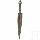 A Luristan bronze dagger, late 2nd - early 1st millenium B.C.Blade with wide central ridge. The hilt