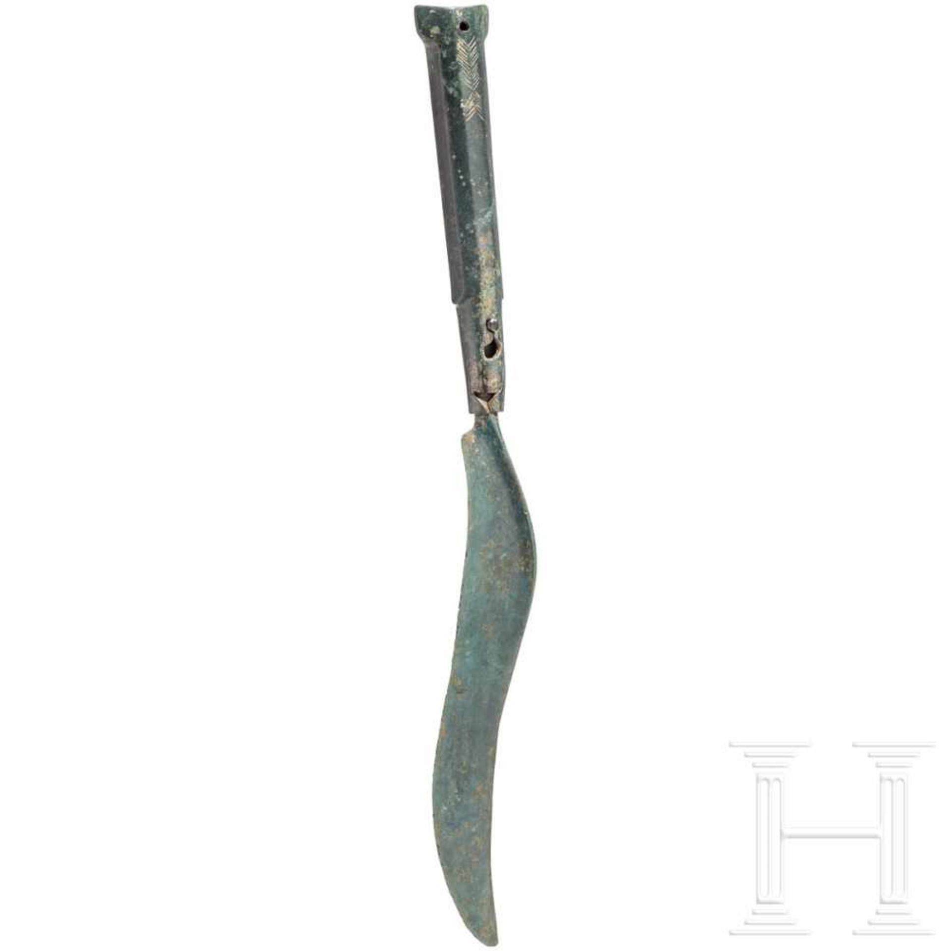 An extraordinary Bronze Age knife with bronze handle, Central Europe, circa 12th - 9th century B.C.