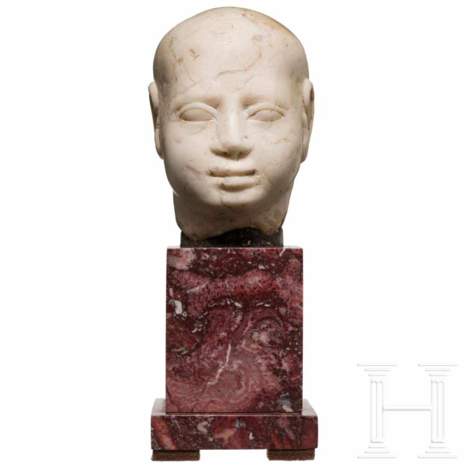 A late Egyptian marble head, 6th – 1st century B.C.Beautifully worked marble head of a statuette.