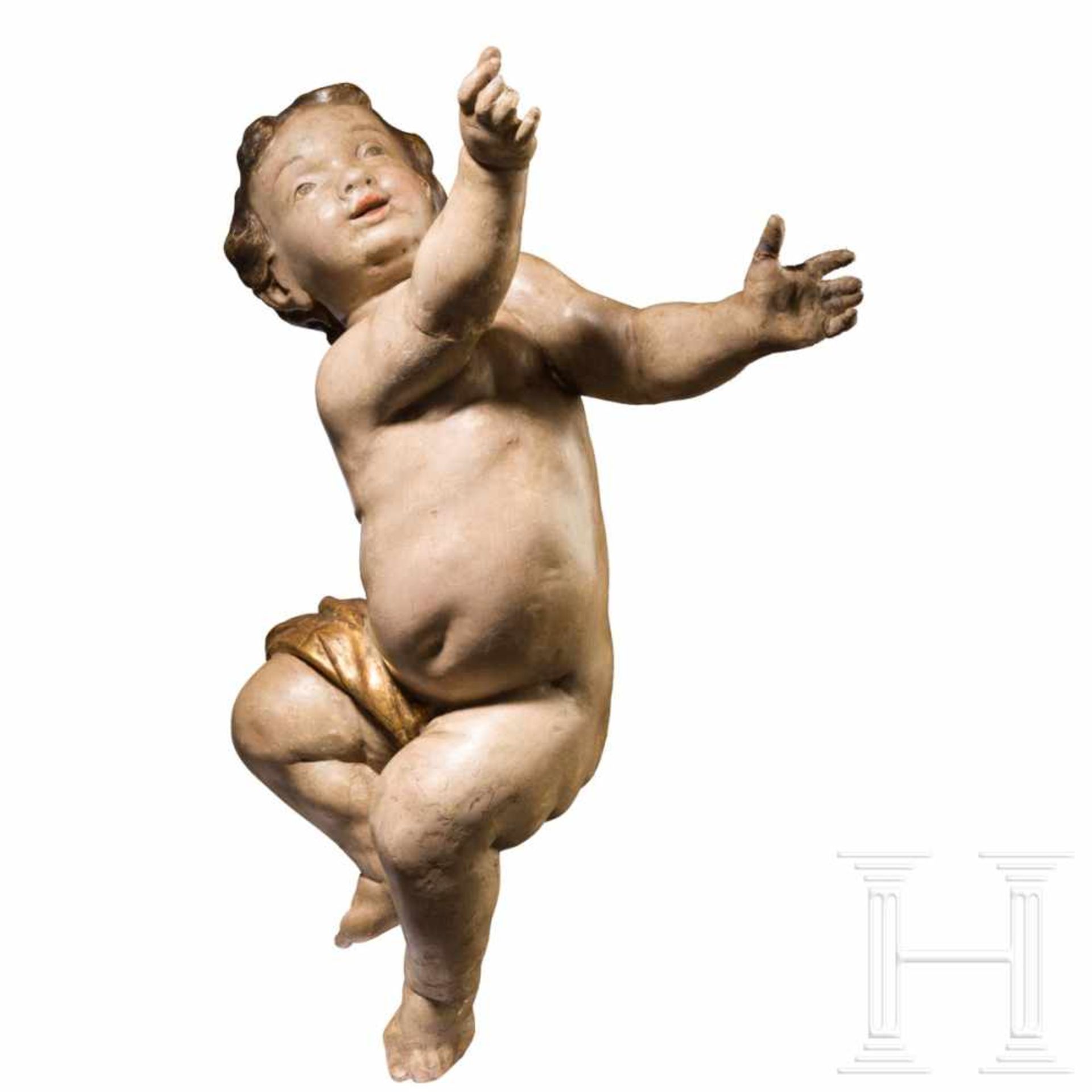 A large southern German coloured wooden sculpture of a putto, circa 1750Aus Weichholz geschnitzte