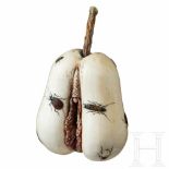 A signed Japanese ivory Shibayama Zaiku in the shape of a a fruit/vulva inlayed with insects, late-