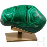 A large malachite core mounted on a brass base, probably Russia, mid 20th centuryA solid malachite