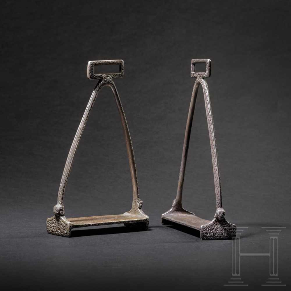 A pair of Northern or Eastern European silver Viking stirrups, circa 11th centuryA pair of high,