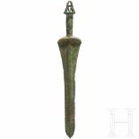 A Luristan bronze sword, late 2nd millenium B.C.Blade with flat, wide central ridge. In the lower