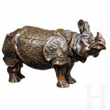 A darkly patinated Italian bronze inkwell stand in the shape of a rhinozeros, probably Padua, 19th