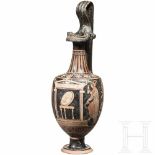 An imitation of an Apulian red figure oinochoeRed figure oinochoe with raised handle. Both ends of