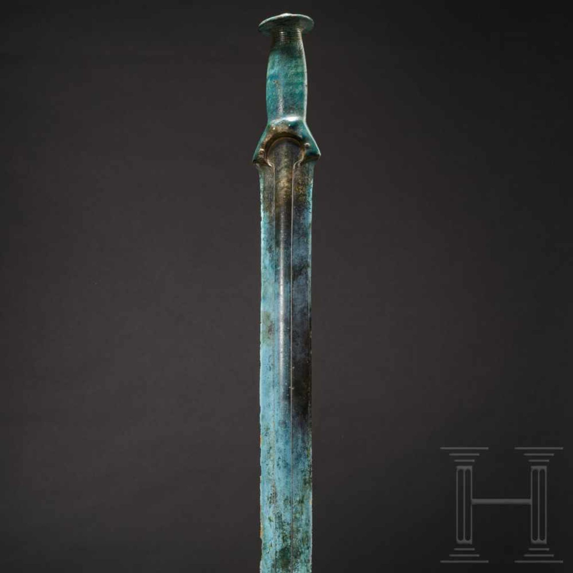 A German bronze sword of the Riegsee type, 1300 – 1200 B.C.A beautifully preserved bronze sword with