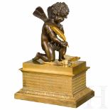 A neoclassical French fire gilded ink stand with a Cupid, Paris, circa 1830Two parts. Wooden core.