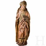 A South German sculpture of a church father, circa 1500The lime wood figure painted in colour and