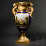 A striking deluxe handle vase, KPM, Berlin, circa 1860The porcelain vase with views of the new