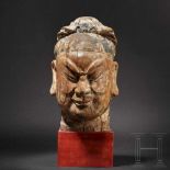 An imposing Chinese carved head of a high-ranking official, Ming dynasty, 16th/17th centuryCarved in