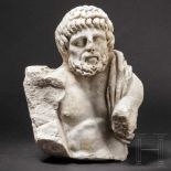 A fragment of a Roman marble figure, 2nd – 3rd centuryMarble fragment of a male three-quarter figure